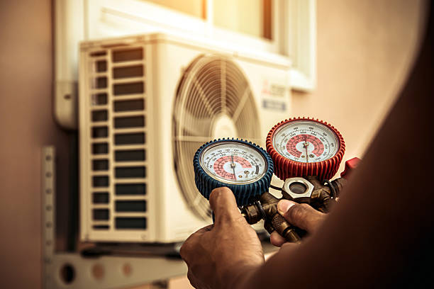 Professional Heat Pump Repair technician working in Rome, IL